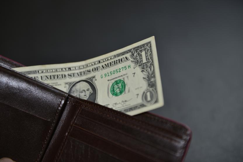 Dollar bill in a wallet